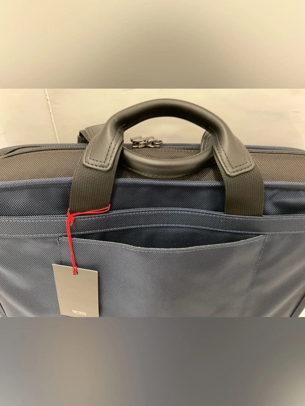 Tumi up sale